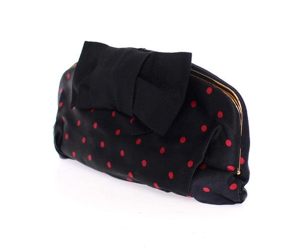 Black polka dotted silk clutch